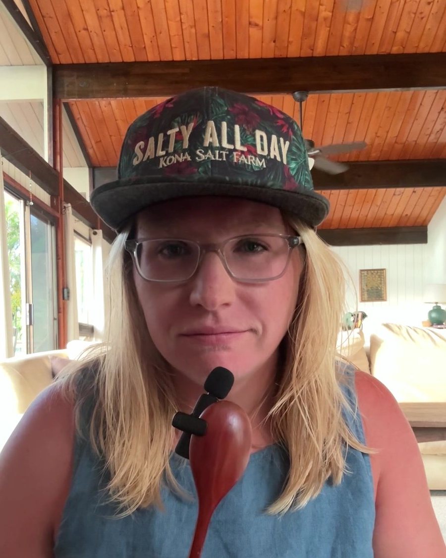 Joanne filming a talking-head video in her living room
